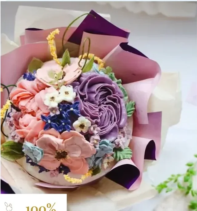A hand-piped buttercream flower cake from Sugarland Bakery